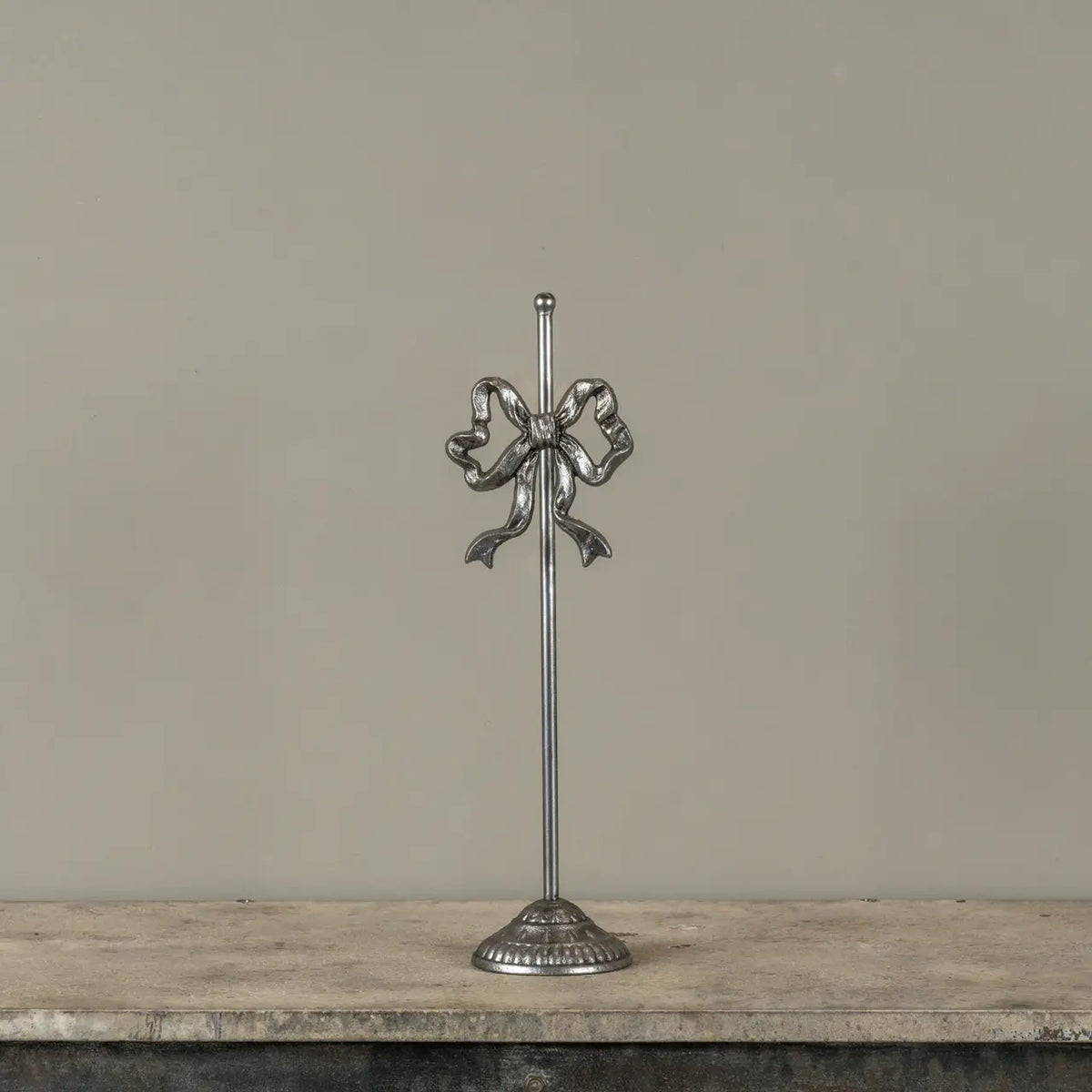 Pewter Bow Display Stand