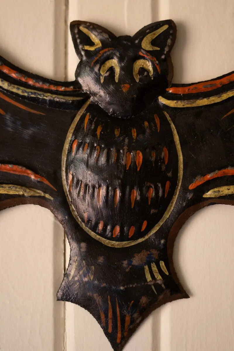 Hand-Hammered Painted Metal Bat Sign