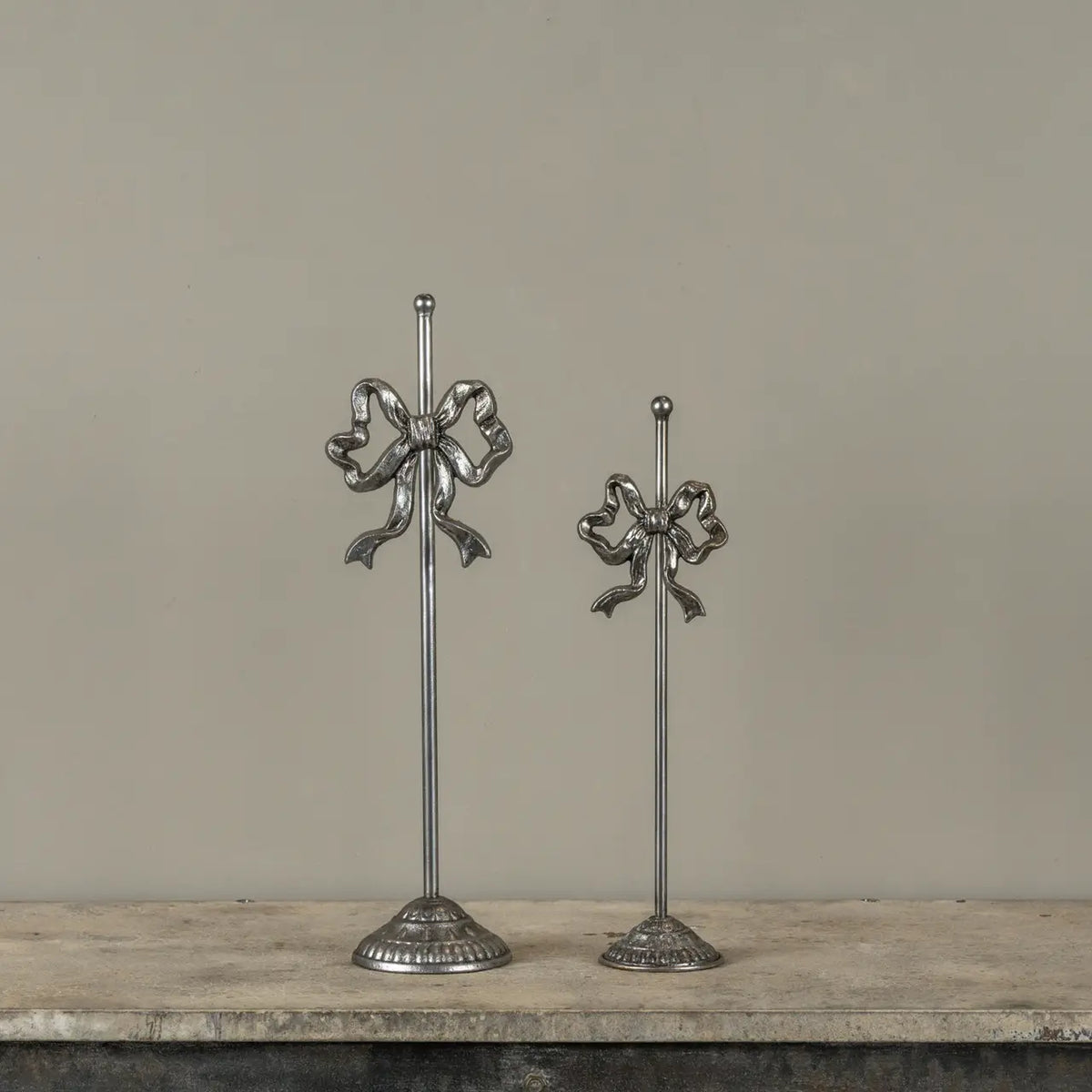 Pewter Bow Display Stand