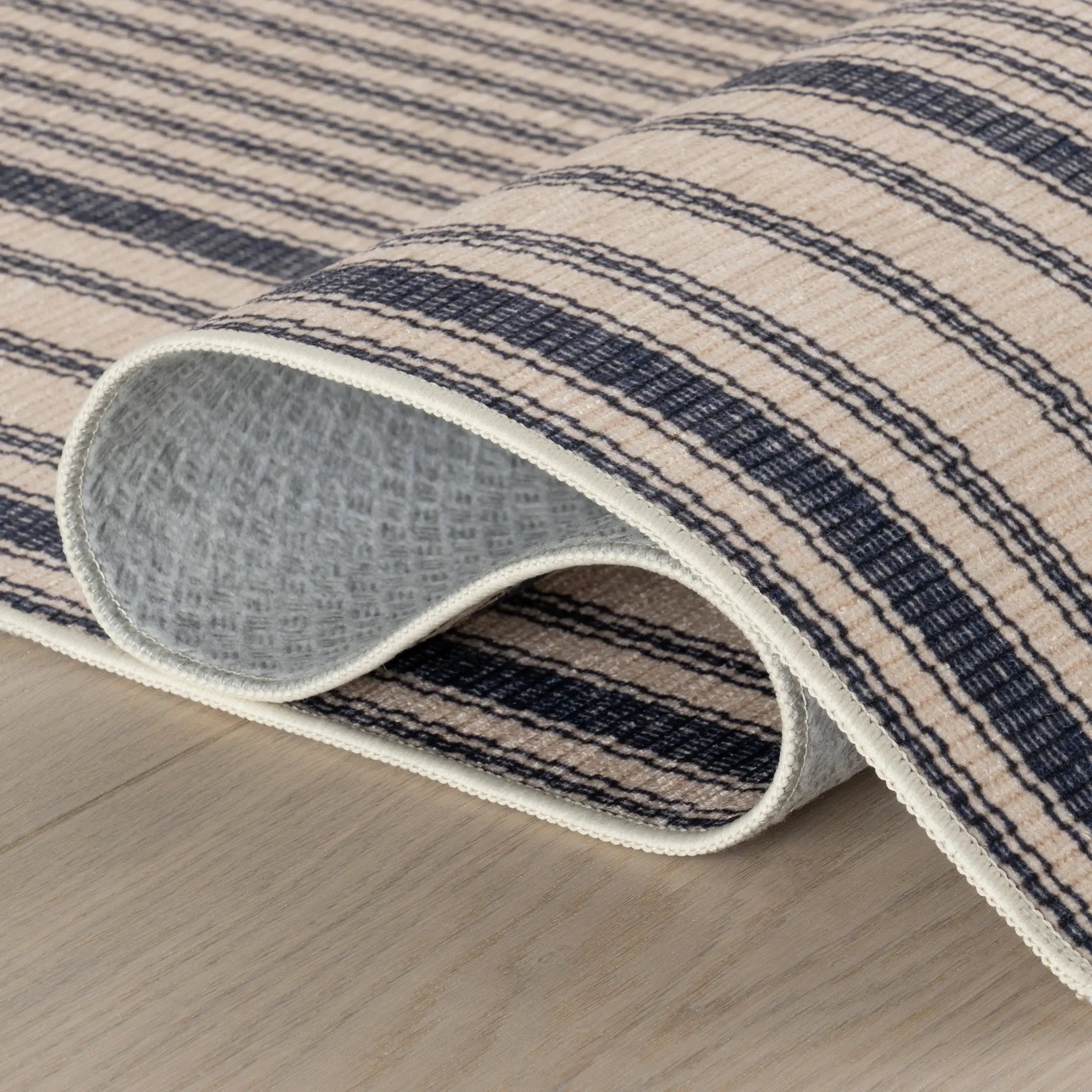 Clemira Coastal Striped Machine Washable Rug