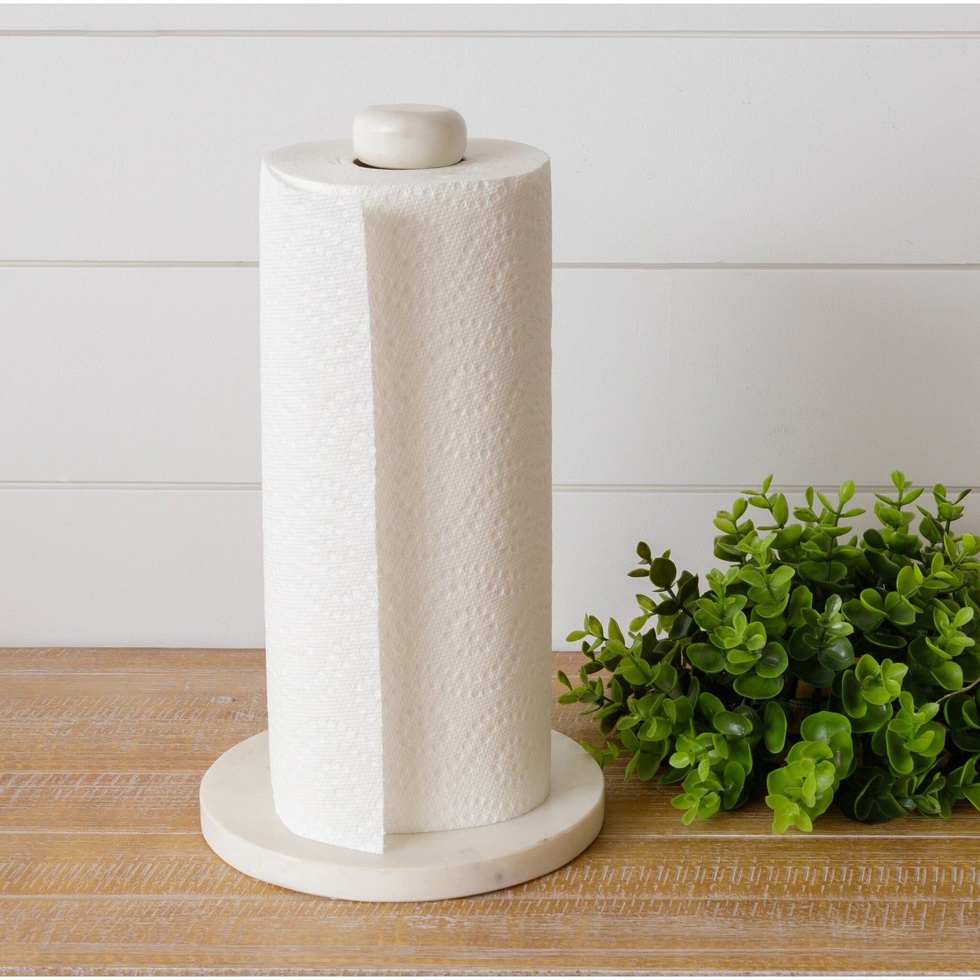 https://www.acottageinthecity.com/cdn/shop/products/Marble_And_Wood_Paper_Towel_Holder_1_5000x.jpg?v=1661693345